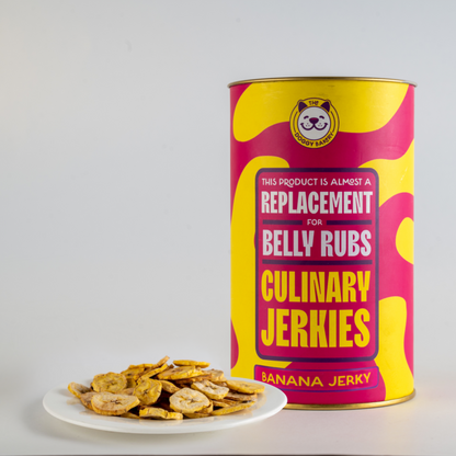 A canister labeled 'Culinary Jerries' with a subtitle 'This product is a replacement for Belly Rubs', alongside a small plate with dehydrated banana chips.