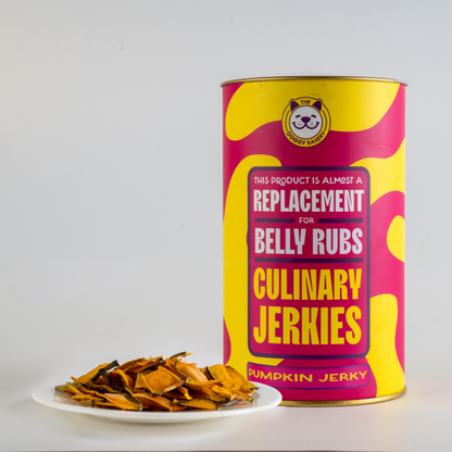 A canister labeled 'Culinary Jerkies' with a subtitle 'This product is a replacement for Belly Rubs' alongside a small plate with some pumpkin jerky strips.